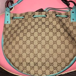 Authentic Gucci Monogram GG drawstring small hobo